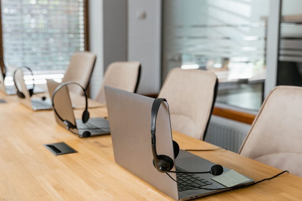 Conference table set with simultaneous interpretation headsets
